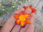 Load image into Gallery viewer, Orange flower bead
