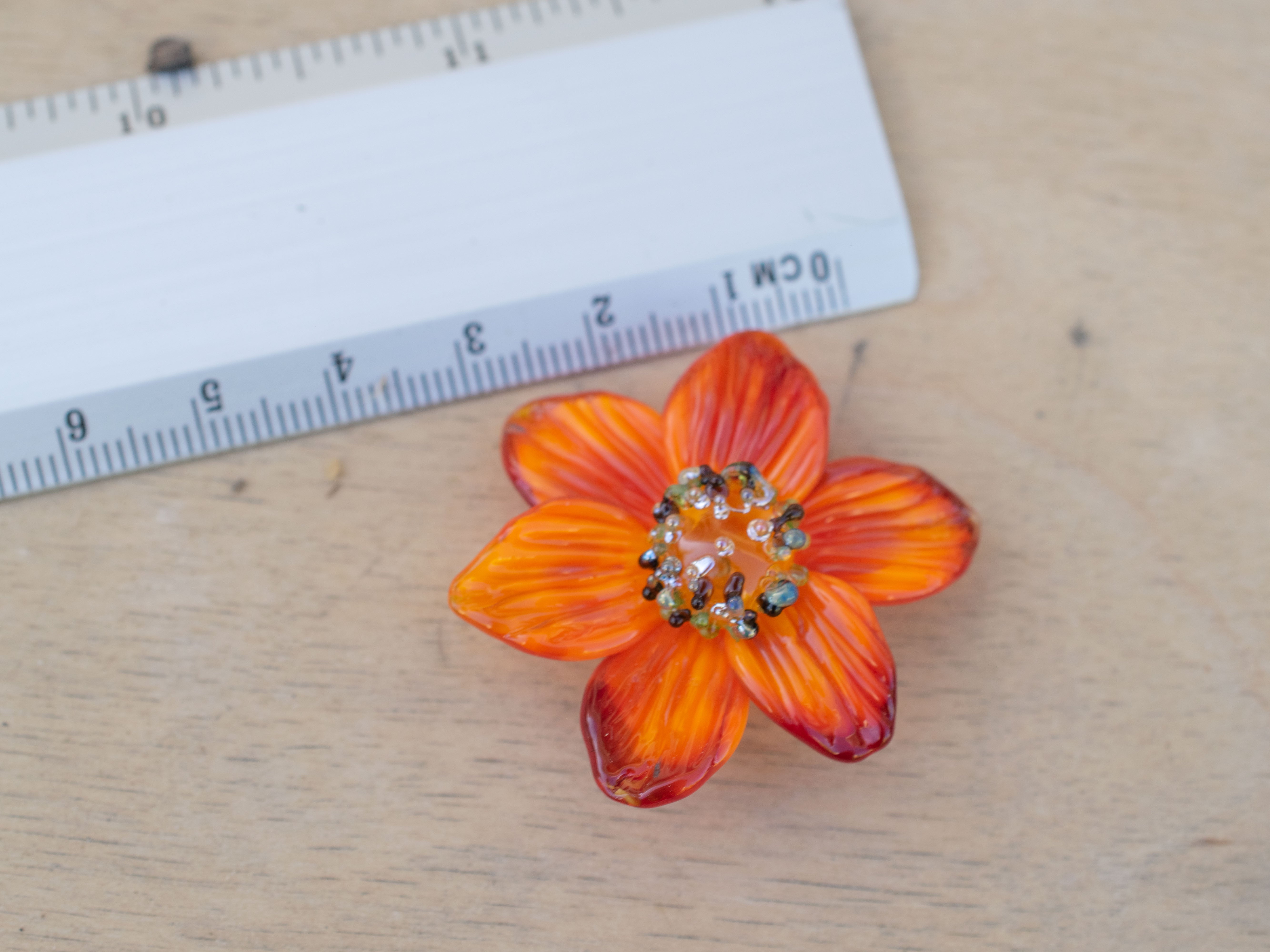 Orange flower bead