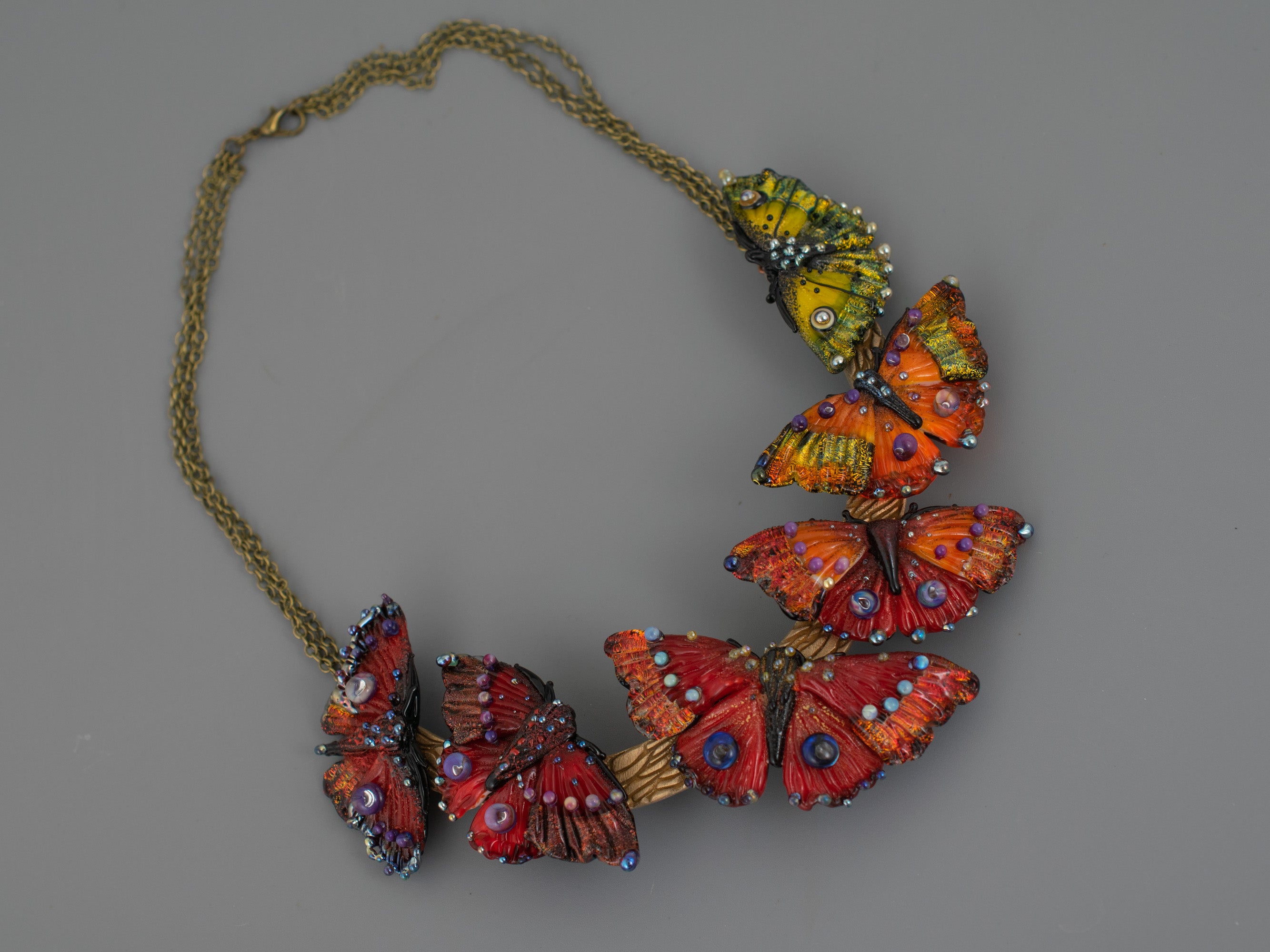 Orange butterfly necklace