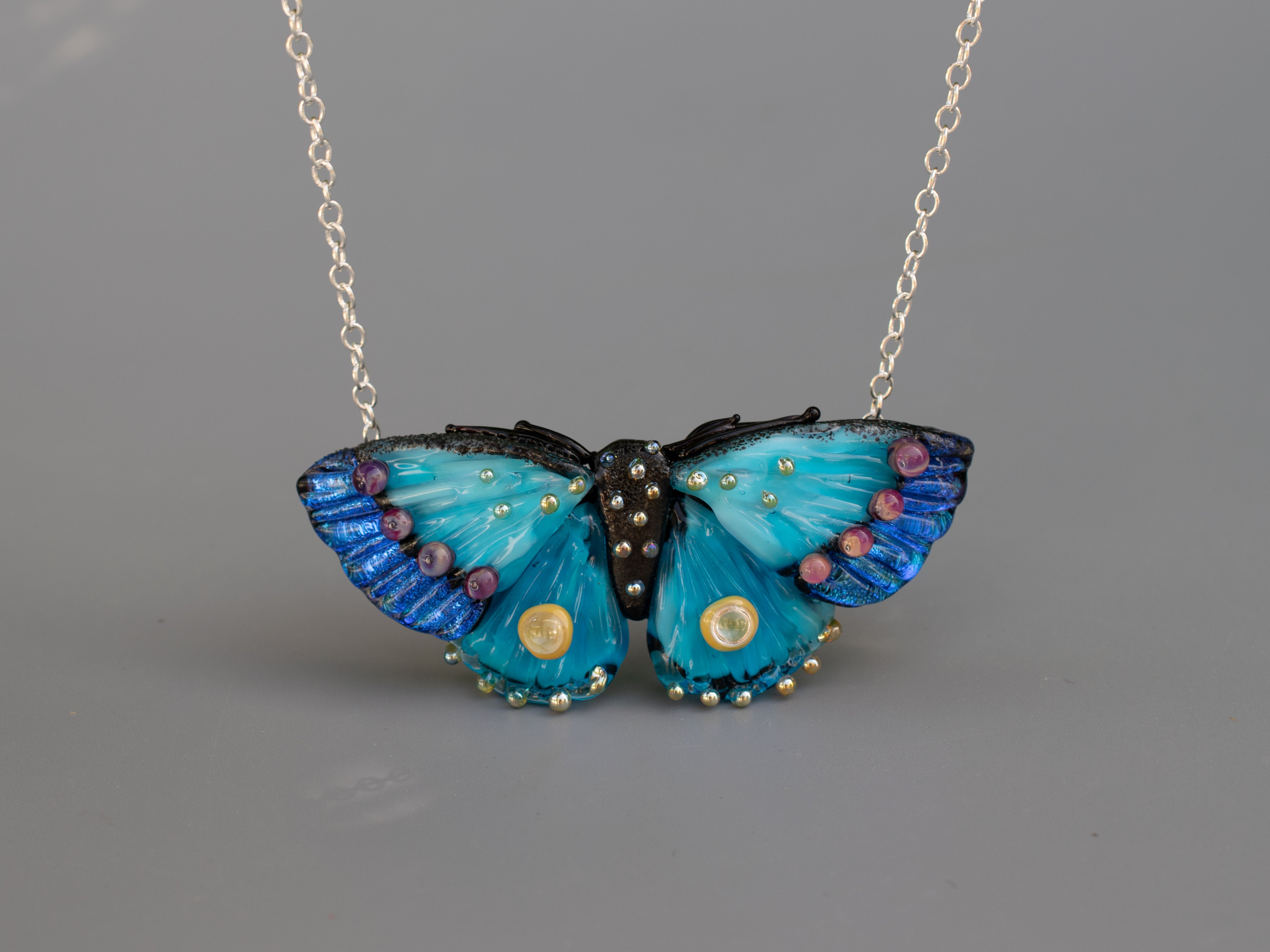 Blue butterfly necklace