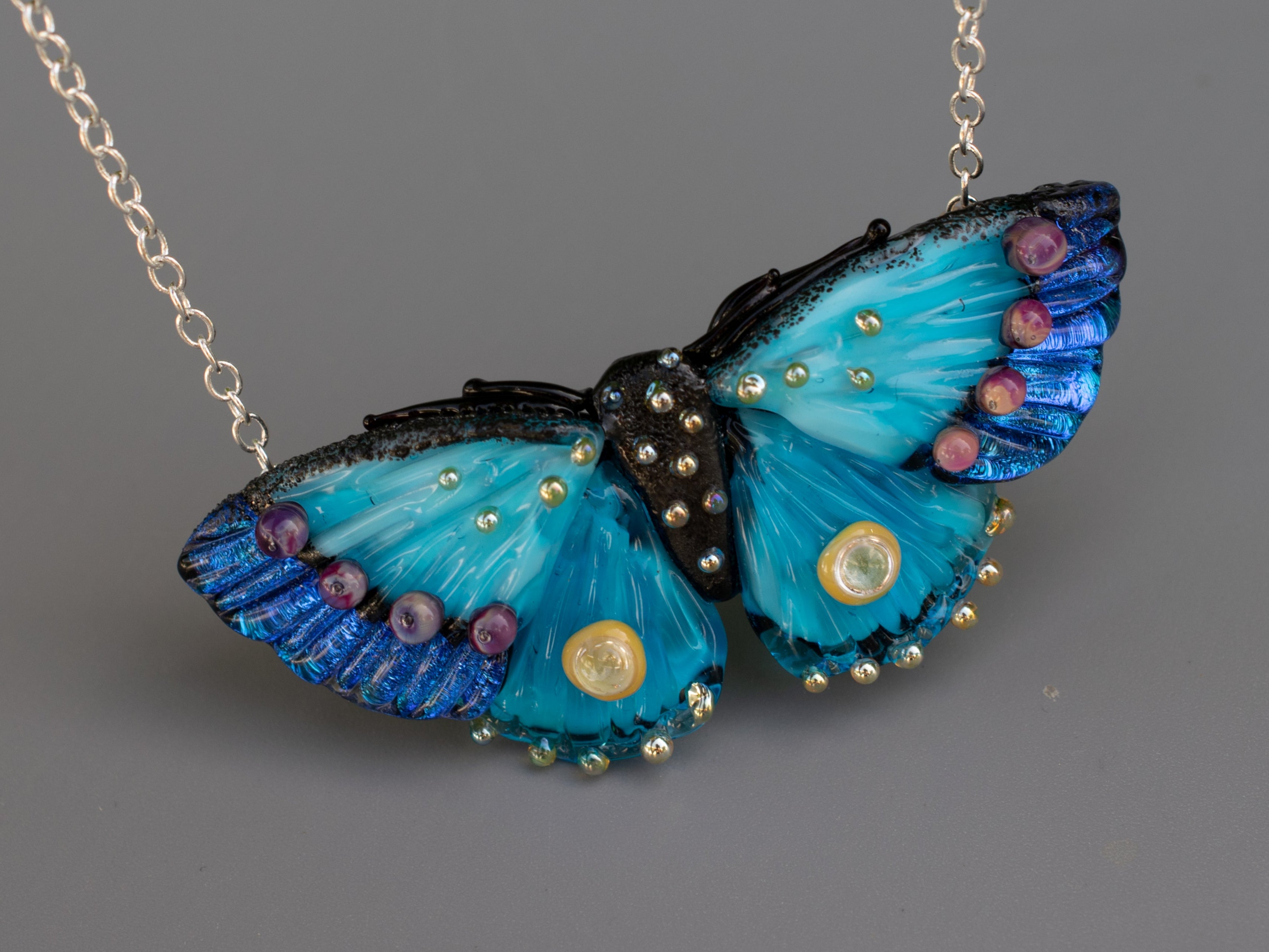 Blue butterfly necklace