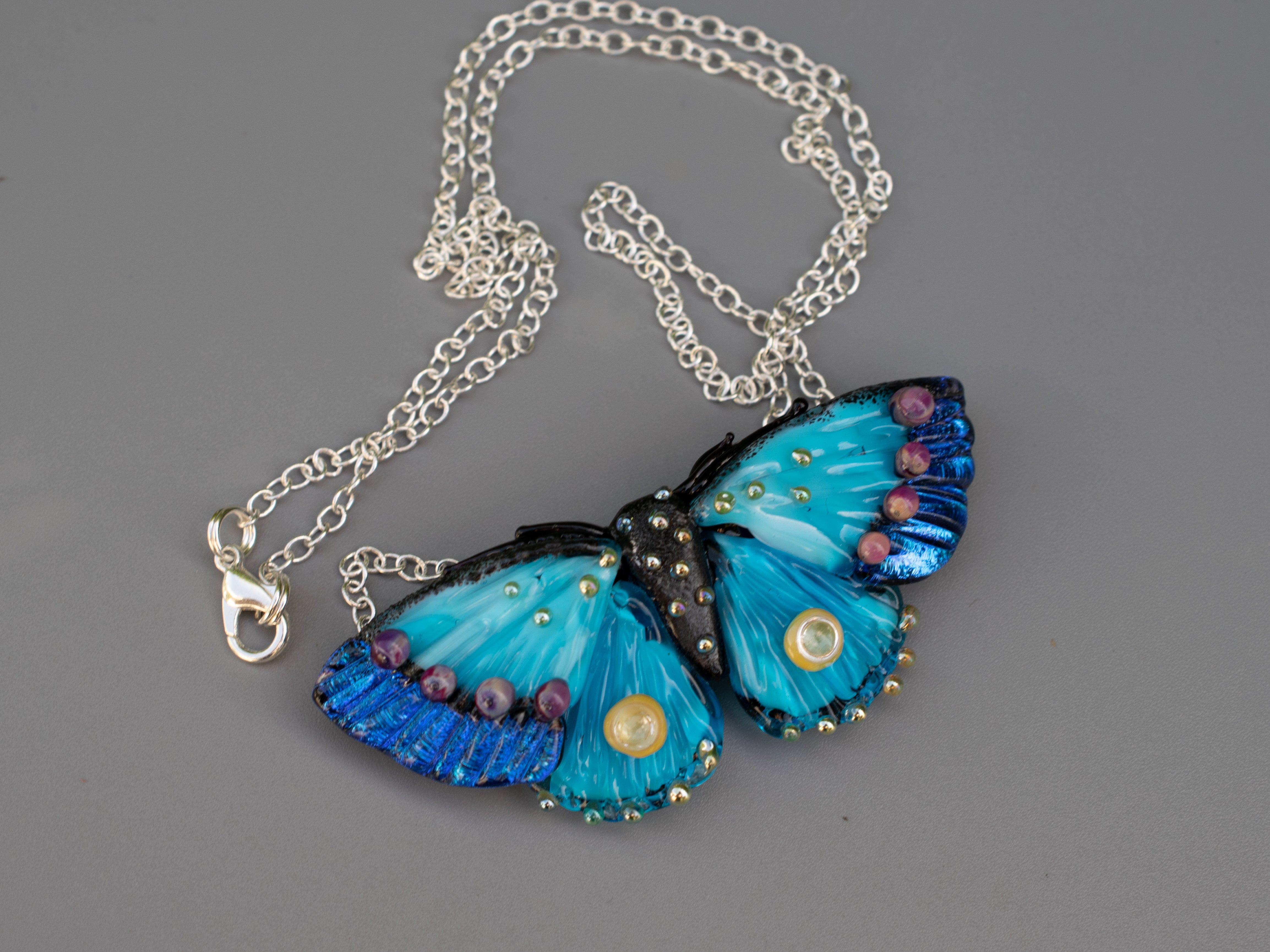 Blue butterfly necklace