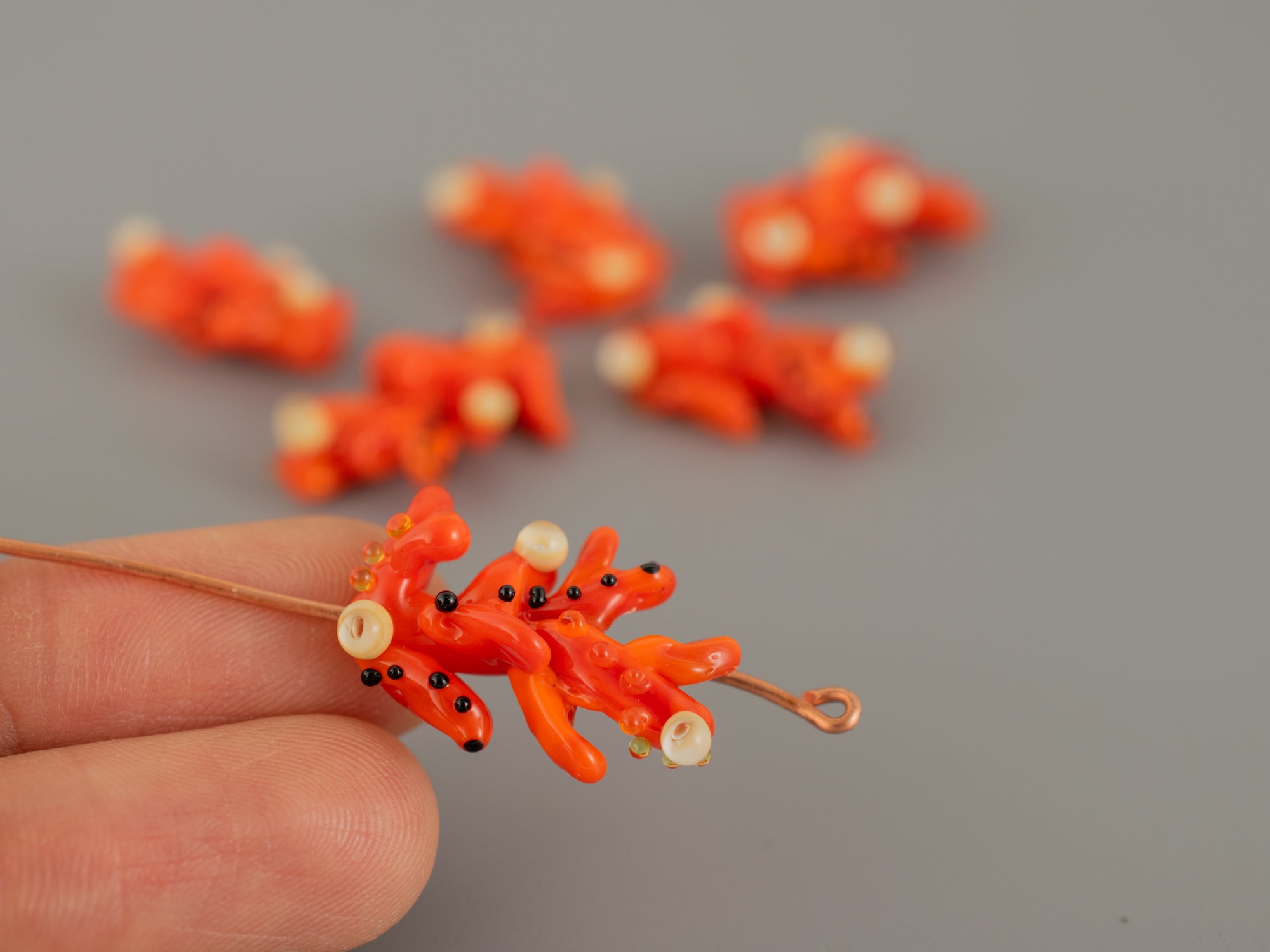 Orange coral glass bead