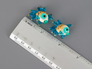 Turquoise fish glass bead