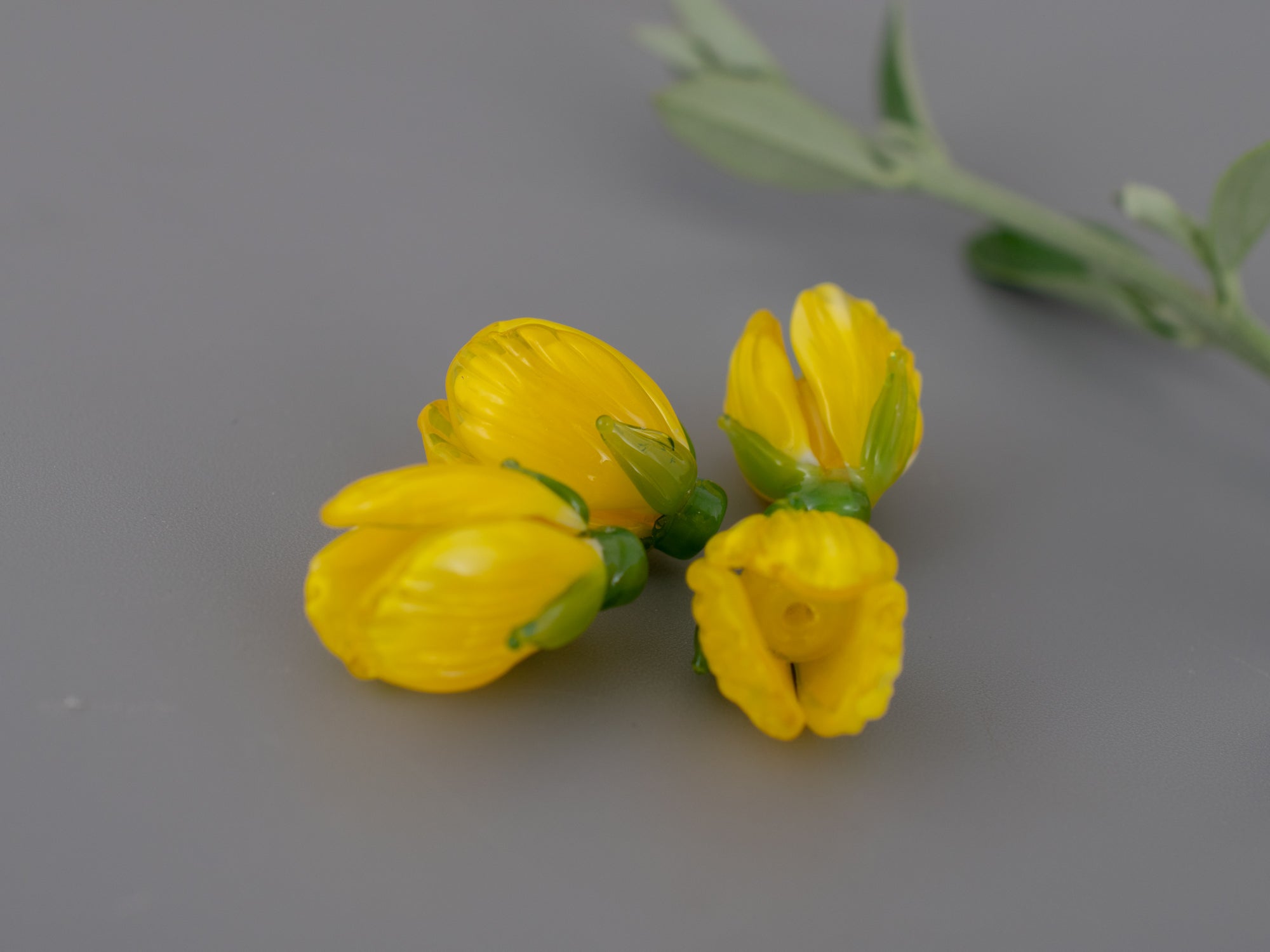 Bright yellow flower bead