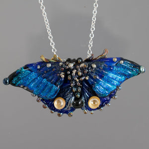 Blue butterfly necklace
